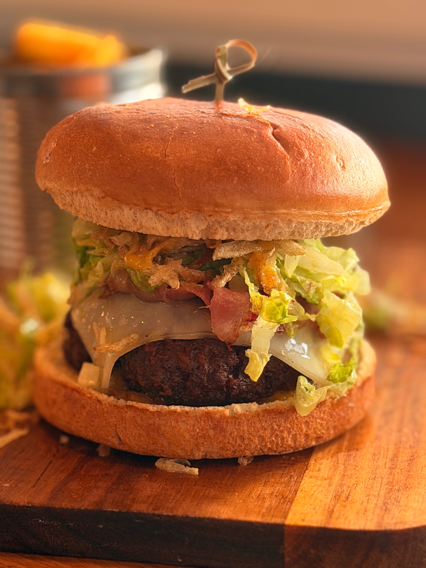 Signature smash burger with bacon, cheese and crispy onions